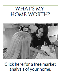 image of a realtor showing customer paper work